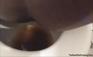 Black babe shitting in toilet