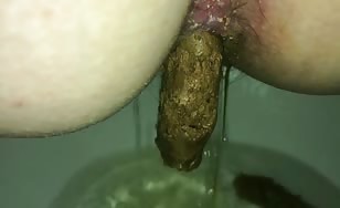Brown turd from a hairy ass