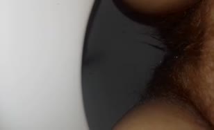 Hairy babe shitting and peeing