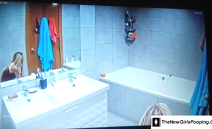 Blonde babe caught pooping