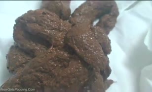 Pooping on a white plate