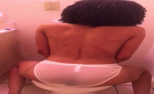 Ebony girl with curly hair shits in panties