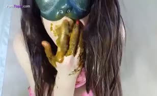 Masked college girl smears a lot of brown shit