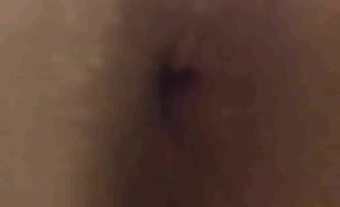Close up of shaved teen shitting