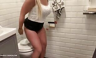 Nice looking blonde lady pooping 