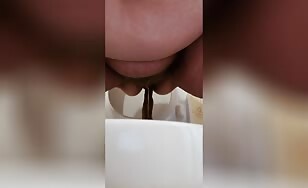 Big belly bbw lady poops in the toilet 