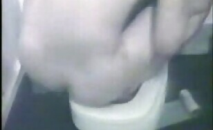 Amazing round ass lady shitting hard in the toilet 