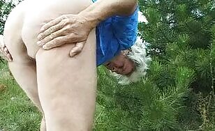 Granny outdoor shitting in the backyard 