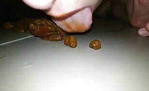 Girl licking shit closeup 