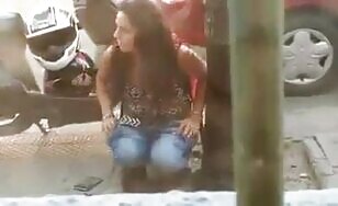 A girl poops and then takes a photo  