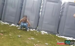 A girl poops at a festival  