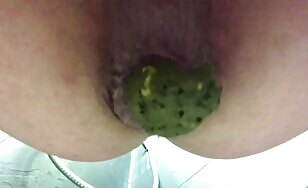 Natural MILF smears scat on saggy tits in shower