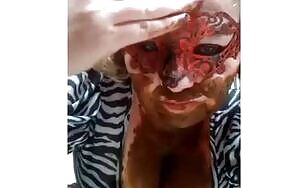 Mature lady smearing shit on her face 