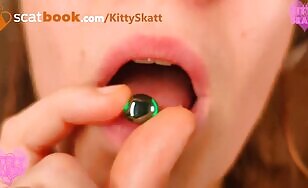 Woman eats and shits glass marbles - 00:21