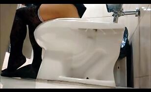 Lady Poops Under the Stall